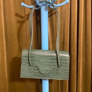 Small green faux alligator skin purse